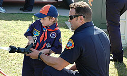 Photo of Firefighter and Boy Scout