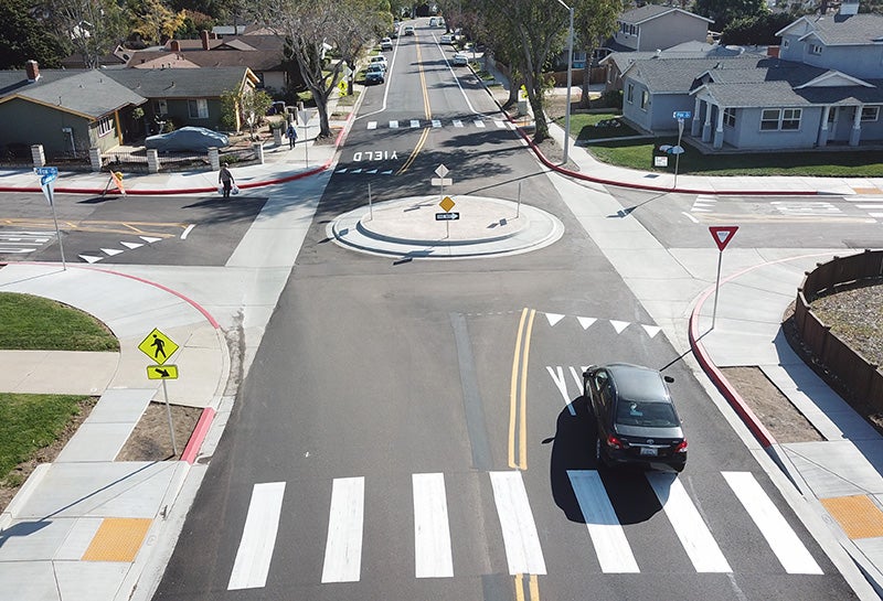 A roundabout in the intersection of Moraga Avenue and Fox Place