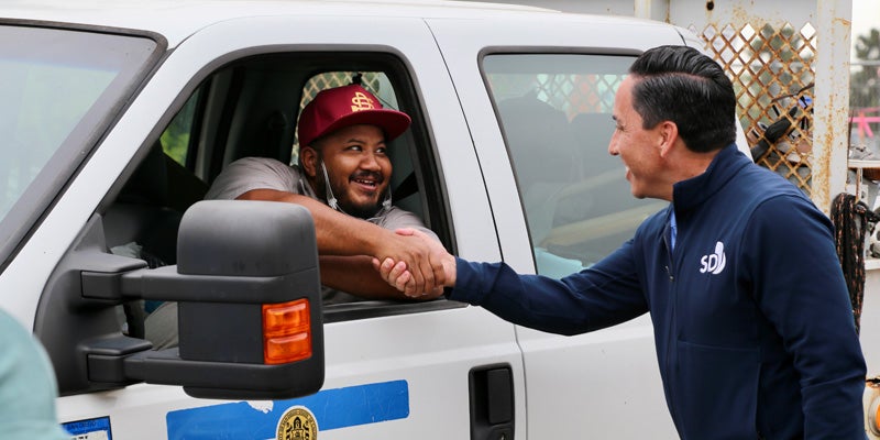 Mayor Todd Gloria and city employee in Clairemont