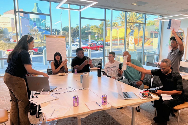 A group of people participating in a focus group activity