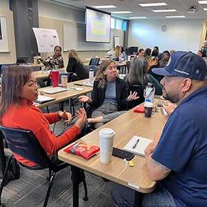 City staff discussing a topic as a group in a workshop