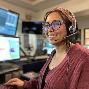 A dispatcher at the Fire-Rescue Emergency Command and Data Center