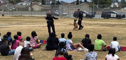 San Diego Police K-9 Unit making a presentation in front of school children