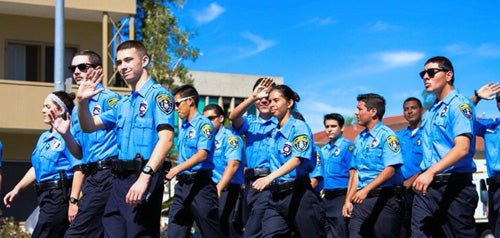 A group of San Diego Police cadets marching during a ceremony