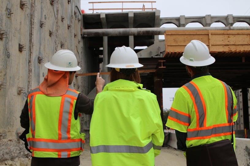 City staff at construction site.