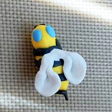 Yellow bee made out of polymer clay