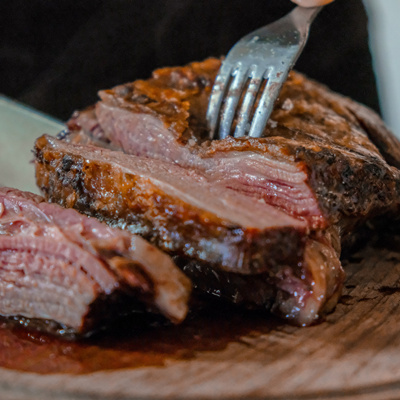 Grilled meat with fork