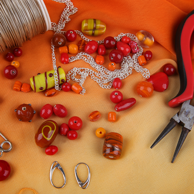 Image of red beads on a table