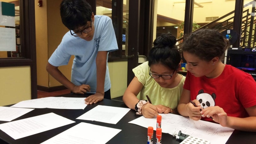 Students working on a project in the Bio Lab at the La Jolla Library