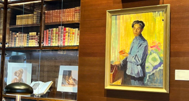 Photo of a wood-panelled wall inside the Hervey Family Rare Book Room displaying a painting titled "Jung Hoon " by Leslie William Lee, 1939.