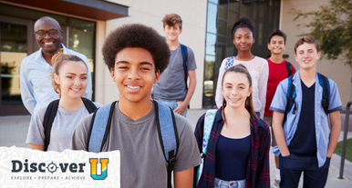  A group of diverse teenage male and female students wearing backpacks and their teacher smiling for the camera. They are outside a building. In the lower left corner is small black, gold, and teal text stating “DiscoverU” and “Explore. Prepare. Achieve.” on a white background.