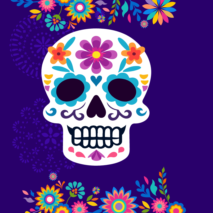 A sugar skull is decorated with floral and heart designs.