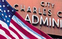 Photo of City Administration Building and Flag