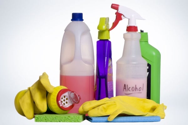 Cleaning supplies laid out on the floor