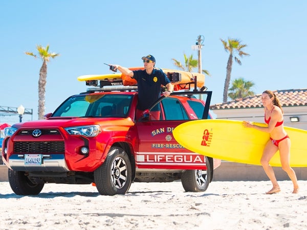 photo of Lifeguard Toyota vehicle on the beach